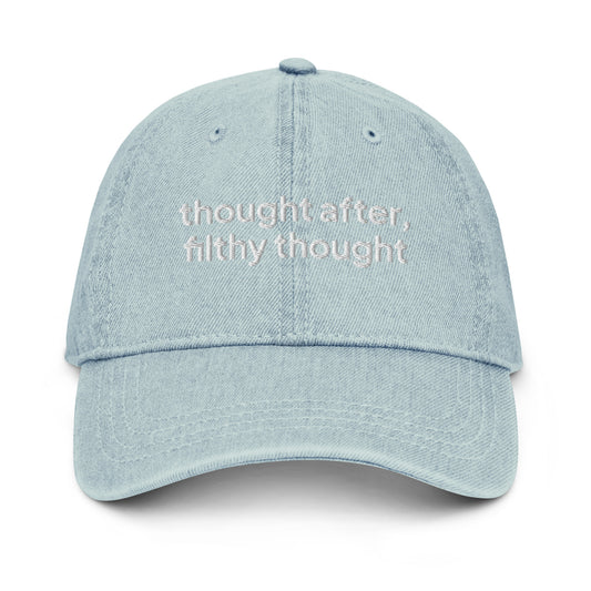 Washed-out Blue 100% cotton denim dad cap with the slogan 'thought after, filthy thought' embroidered on it